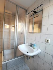 Et badeværelse på Domizil Am Stadtzentrum