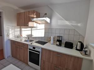 Køkken eller tekøkken på Domizil Am Stadtzentrum