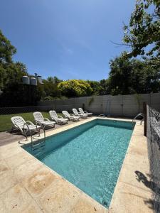 Swimmingpoolen hos eller tæt på Cabañas Los 5 Sauces + 89 billeder