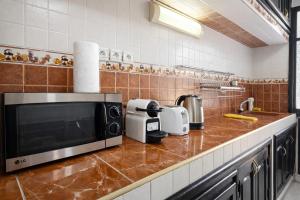 Η κουζίνα ή μικρή κουζίνα στο Sabor Apart Gueliz -Only Family-