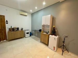 Køkken eller tekøkken på Stúdio Prox Centro Garagem Privado