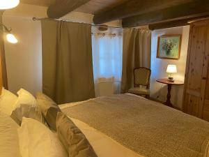 Giường trong phòng chung tại Chalet Rayon de Soleil Gryon Villars