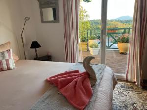 Postel nebo postele na pokoji v ubytování Émeraude view