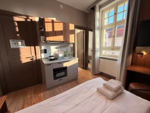 Køkken eller tekøkken på Amaroo - Apartments "Regia"