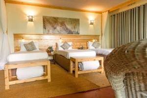 Postel nebo postele na pokoji v ubytování Olea Farm Lodge