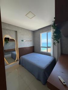 En eller flere senge i et værelse på Cobertura dúplex frente mar