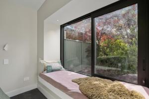 Postel nebo postele na pokoji v ubytování Brow Peak View - Arrowtown Holiday Home