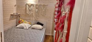 En eller flere senge i et værelse på Bambolina