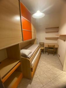 Ένα ή περισσότερα κρεβάτια σε δωμάτιο στο Tamagno Residence - Comfort in the Heart of the City