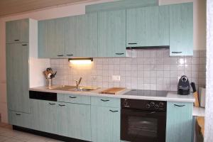 Kuchyň nebo kuchyňský kout v ubytování Appartement au coeur de la nature