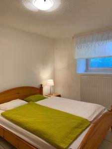 Postel nebo postele na pokoji v ubytování Appartement au coeur de la nature