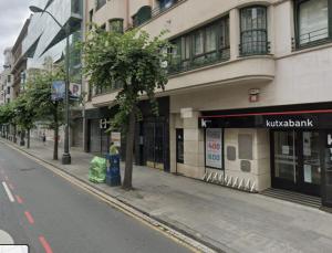 an empty street in front of a building at Bilbao City Center in Bilbao