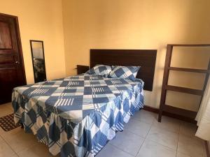 Giường trong phòng chung tại Casa Vásquez