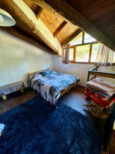 Giường trong phòng chung tại Alojamientos Titin