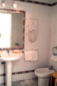 Kúpeľňa v ubytovaní Hotel Simon