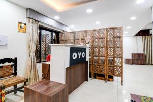 Posezení v ubytování Hotel O R JOHNSON + 28 fotografií