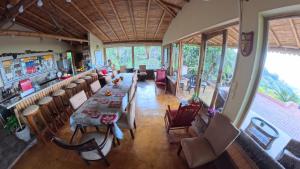 an overhead view of a restaurant with tables and chairs at Cascada Sagrada in Pijao