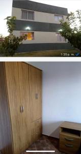 una stanza con un armadio di legno e un edificio di Centro San Rafael 1 a San Rafael