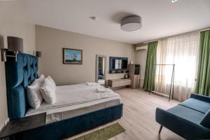 Μια τηλεόραση ή/και κέντρο ψυχαγωγίας στο Garni Hotel Mediteraneo