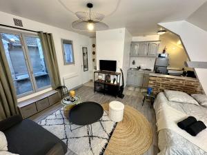 Et tv og/eller underholdning på Le Comfy Studio Central proche Disney & Paris