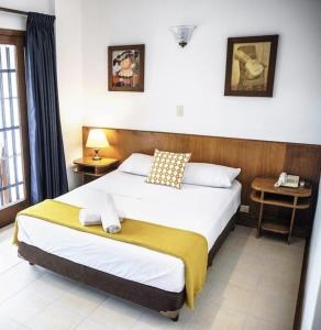 Postel nebo postele na pokoji v ubytování Hotel Balcones De Malibu + 23 fotografií