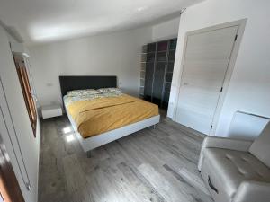 Ένα ή περισσότερα κρεβάτια σε δωμάτιο στο TORTOLI STATION by SARDINIA LAB