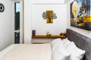 Postel nebo postele na pokoji v ubytování SkyLux Vlašić