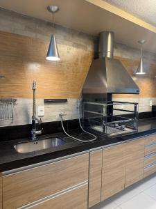 Køkken eller tekøkken på Apartamento confortável em Cabo Frio