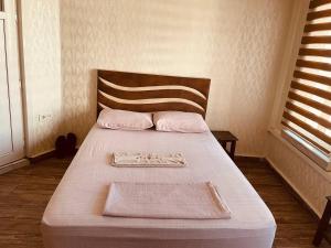 En eller flere senge i et værelse på yeni erciyes gold hotel