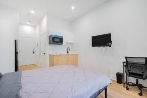 TV/trung tâm giải trí tại Studio tout équipe pour 2- Location par semaine- Parking gratuit