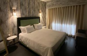 En eller flere senge i et værelse på South Mogador Beach Loft