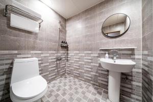 Koupelna v ubytování 레스티아 스테이 강릉역점 + 35 fotografií