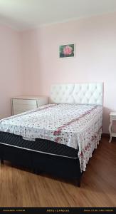 En eller flere senge i et værelse på Apartamento completo piscina churrasqueira + 44 billeder