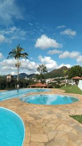 Swimmingpoolen hos eller tæt på Apartamento completo piscina churrasqueira