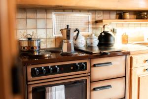 Kuchyň nebo kuchyňský kout v ubytování Le Grenier ALTYPIC