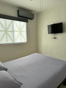 Et tv og/eller underholdning på Hermosa casa céntrica en Playa del Carmen