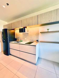 Køkken eller tekøkken på Suite Vista a Reserva y Mar piso15 Bello Horizonte