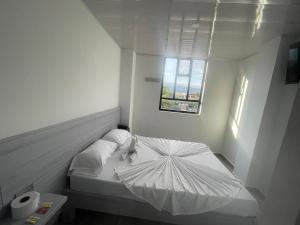 Postel nebo postele na pokoji v ubytování Hoteltokiio