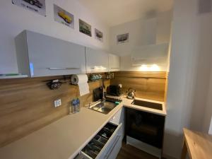 Nhà bếp/bếp nhỏ tại AKS 8a Akademicka przy Onkologii +10 ảnh