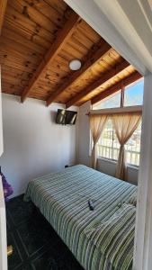 Postel nebo postele na pokoji v ubytování Casa familiar grande El Quisco parrilla y estacionamiento + 74 fotografií