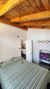 Postel nebo postele na pokoji v ubytování Casa familiar grande El Quisco parrilla y estacionamiento