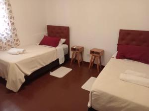 En eller flere senge i et værelse på Furia Calchaquí