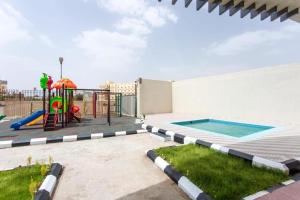 Swimmingpoolen hos eller tæt på حياة ريزيدنس ابها