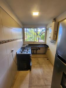 Nhà bếp/bếp nhỏ tại Pinamar centrico