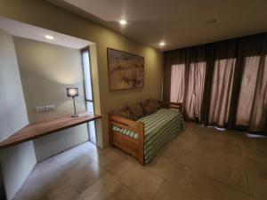 Giường trong phòng chung tại Pinamar centrico