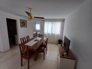 TV a/nebo společenská místnost v ubytování Depto Costa + 2 fotografie