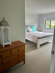 En eller flere senge i et værelse på Ash's Place