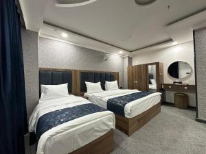 Ένα ή περισσότερα κρεβάτια σε δωμάτιο στο My Flower 1 Hotel