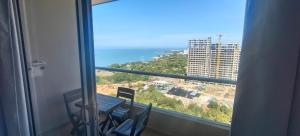 a view of the ocean from a window in a building at Santa marina in Santa Marta