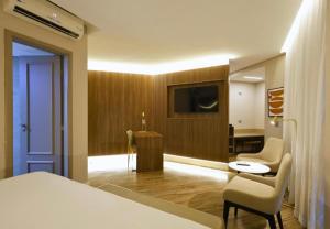 Et tv og/eller underholdning på Hotel Rds Oscar Freire